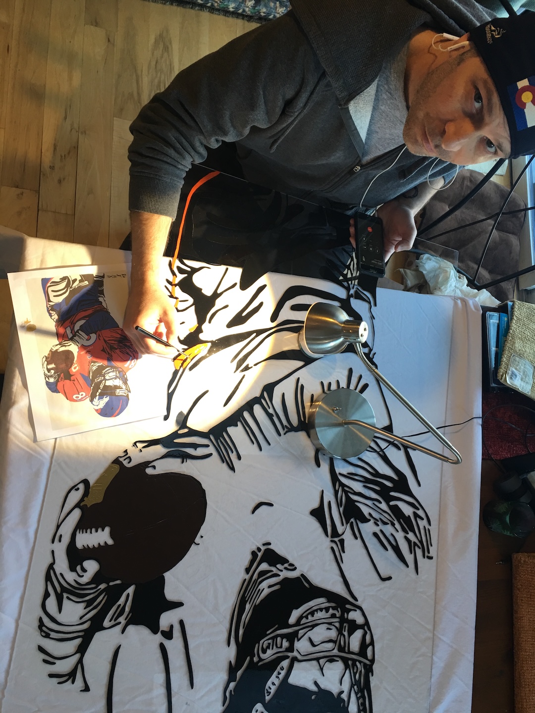 Mike Stemple with his Broncos glass painting